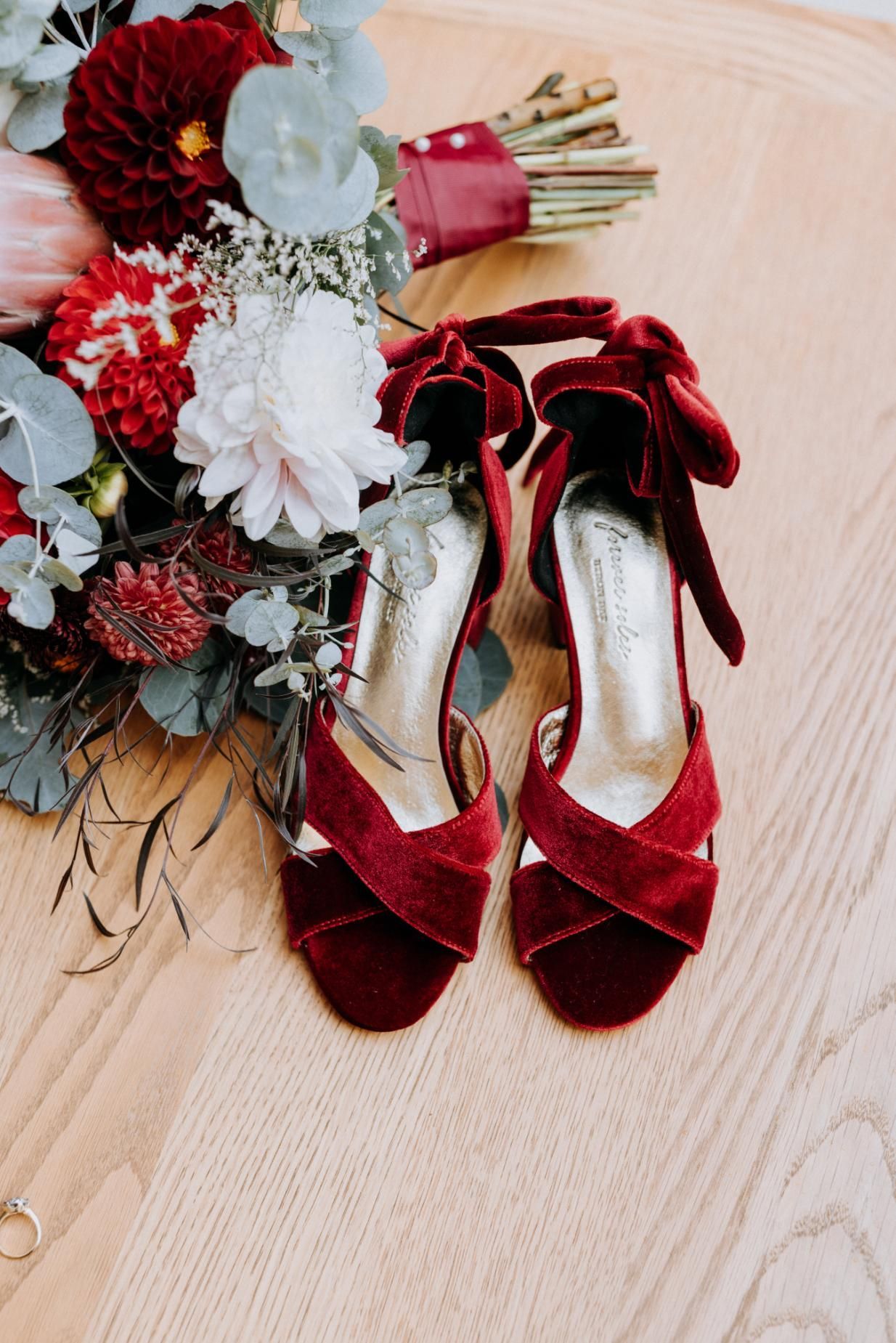 Two Bouquets of Dried Flowers Are Sitting next to some ladies heels — Flowers by Suzanne in Maitland, NSW