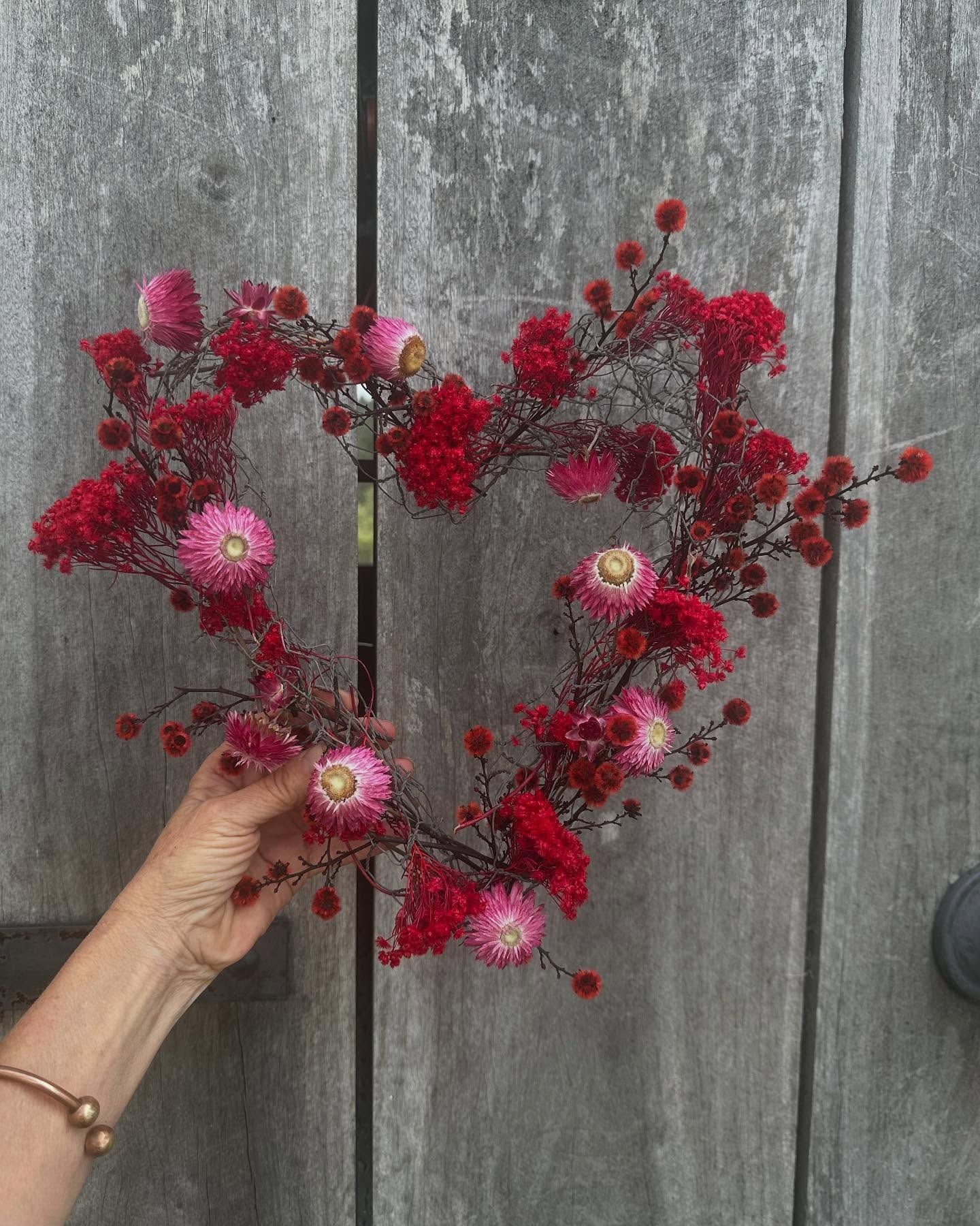 Two Bouquets of Dried Flowers Are Sitting next to some ladies heels — Flowers by Suzanne in Maitland, NSW