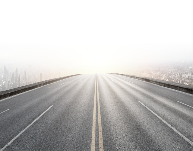 Background of road with city buildings | Walt's Auto & Electric