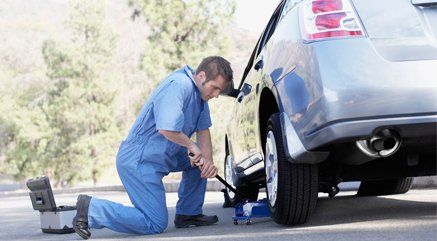 car wheel being replaced