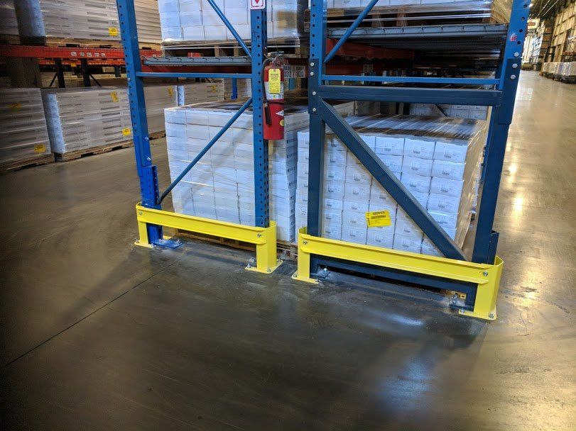 Rack end protection for heavy duty forklift damage