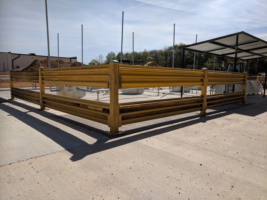 Heavy duty guard rail to protect tanks outside.