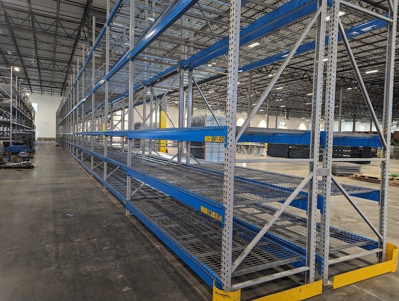 Heavy duty pallet rack system installed back to back 20' high x 48