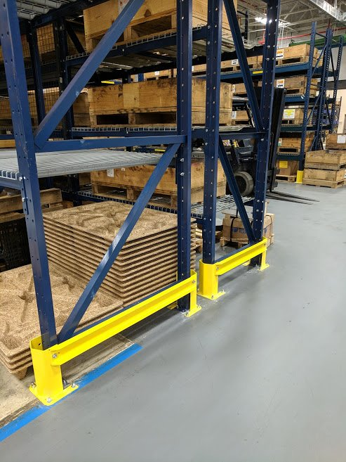 Install pallet rack end protection to keep your uprights safe