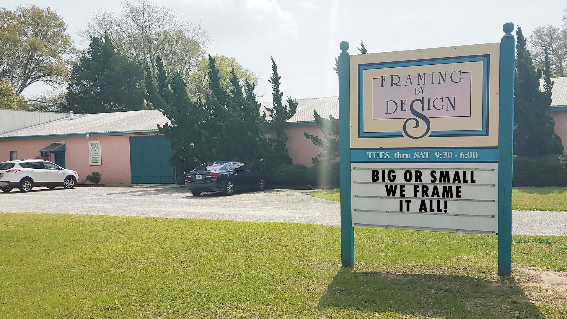 Framing By Design sign