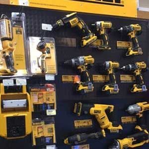 A bunch of rings are sitting on top of each other on display in a store.