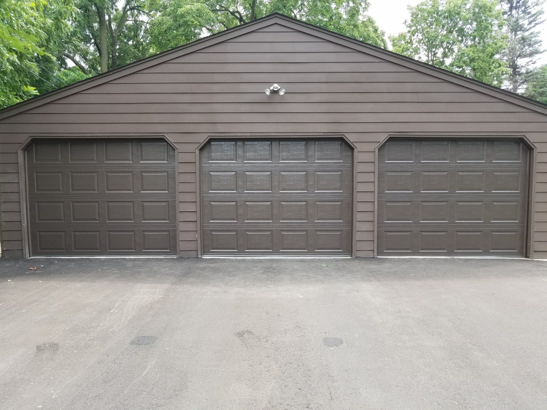 Triple Wooden Garage Door | St. Paul, MN | PDQ Garage Door Service