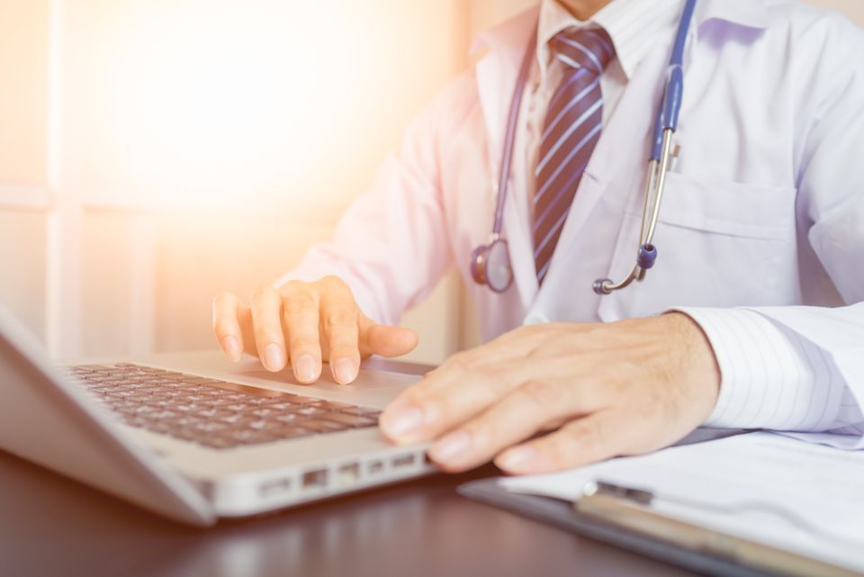 man working on laptop