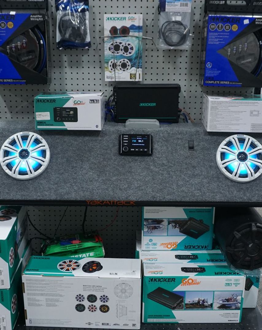 A bunch of boxes on a table with one that says ' sdg ' on it