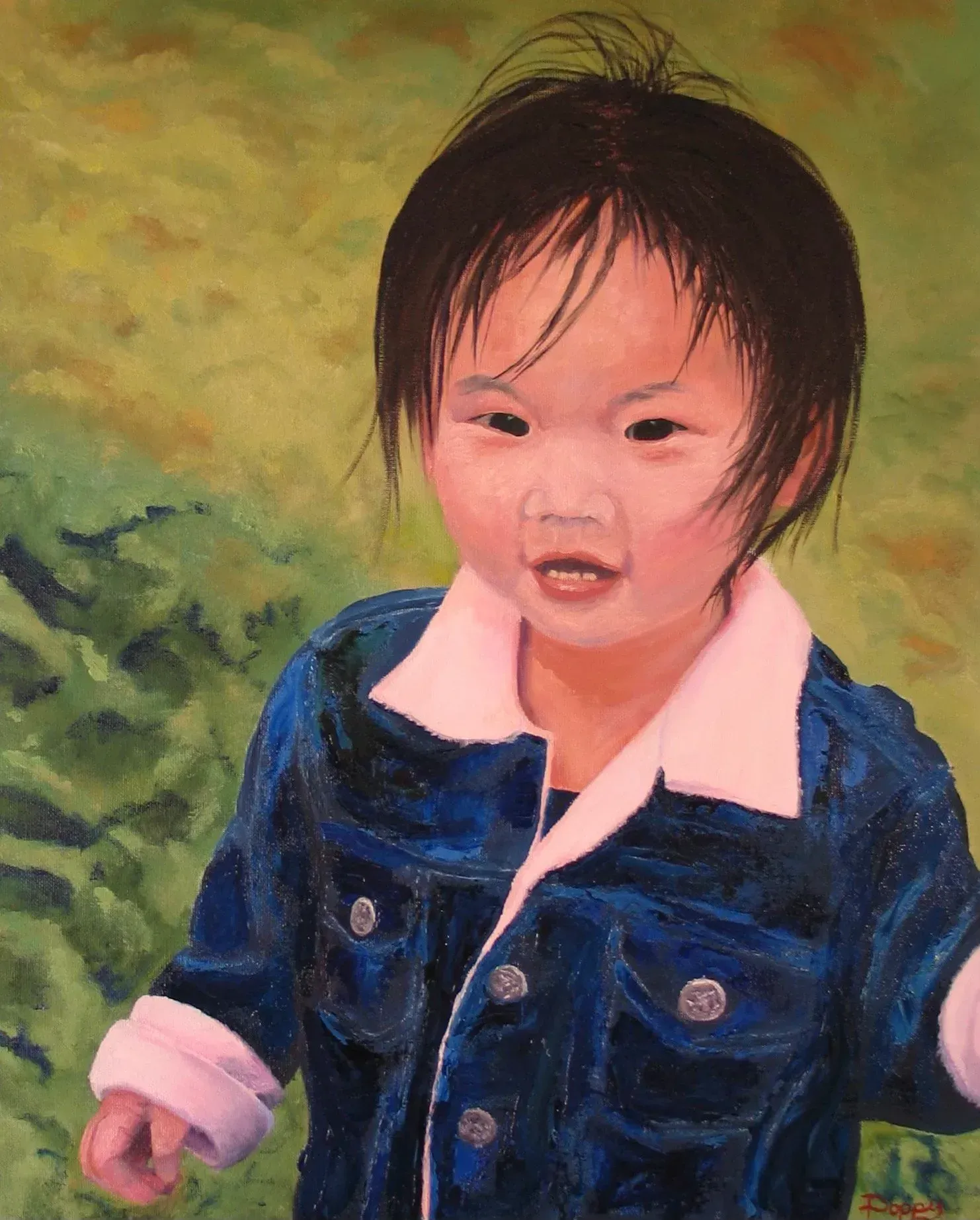 Young child in denim jacket smiles, in front of a green and yellow background.