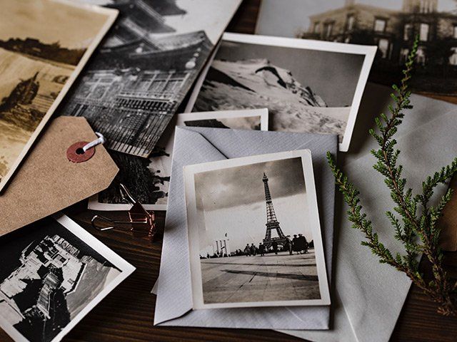 a collection of old photographs including one of the eiffel tower
