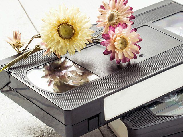 a vhs tape with flowers on top of it