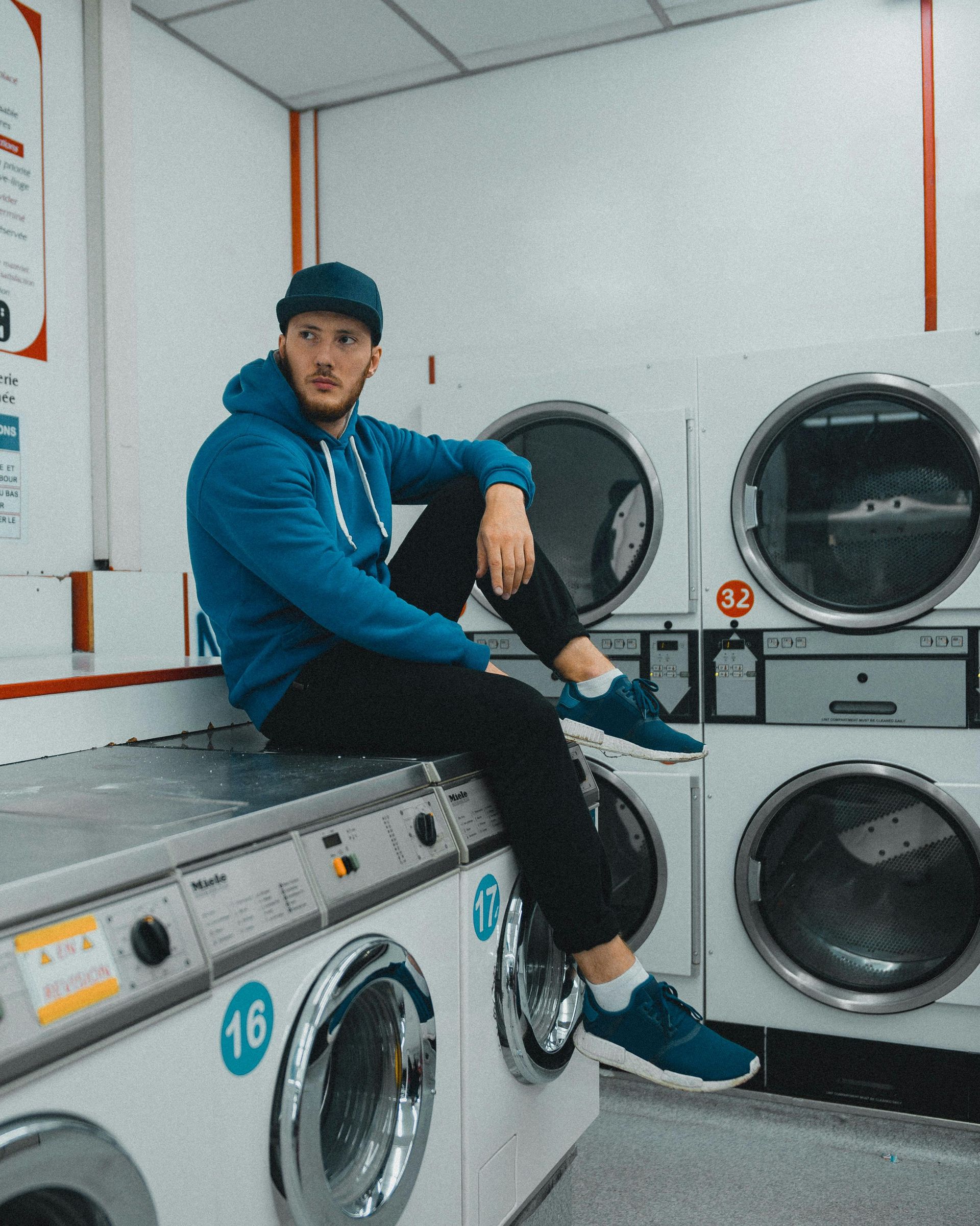 Man at laundromat