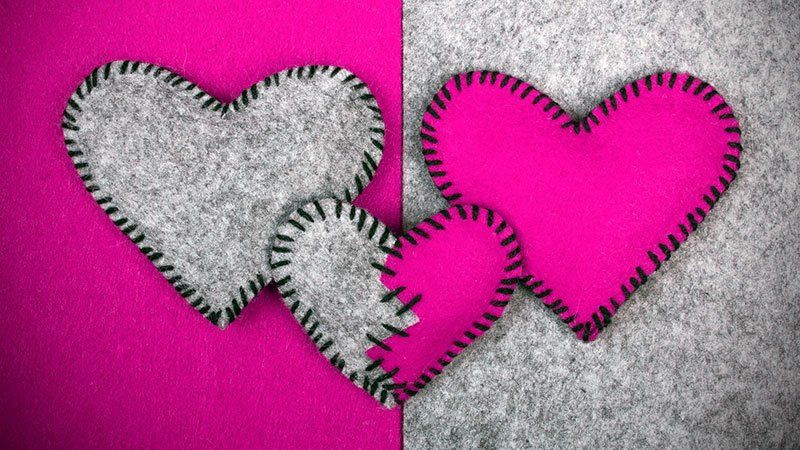 pink and grey stitched fabric hearts