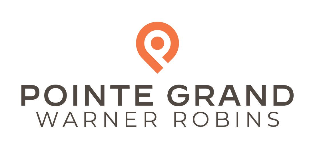 Pointe Grand Warner Robins logo.