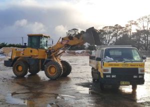 A Bulldozer And A Dump Truck Are Parked In A Muddy Field — Pigot's Midwestern Mini Mix In Orange, NSW