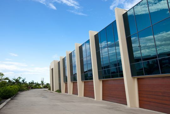 A Large Building With A Lot Of Windows And A Driveway Leading To It — Pigot's Midwestern Mini Mix In Orange, NSW