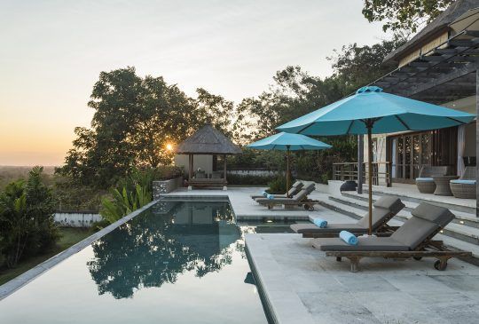 A Large Swimming Pool Surrounded By Chairs And Umbrellas — Pigot's Midwestern Mini Mix In Orange, NSW