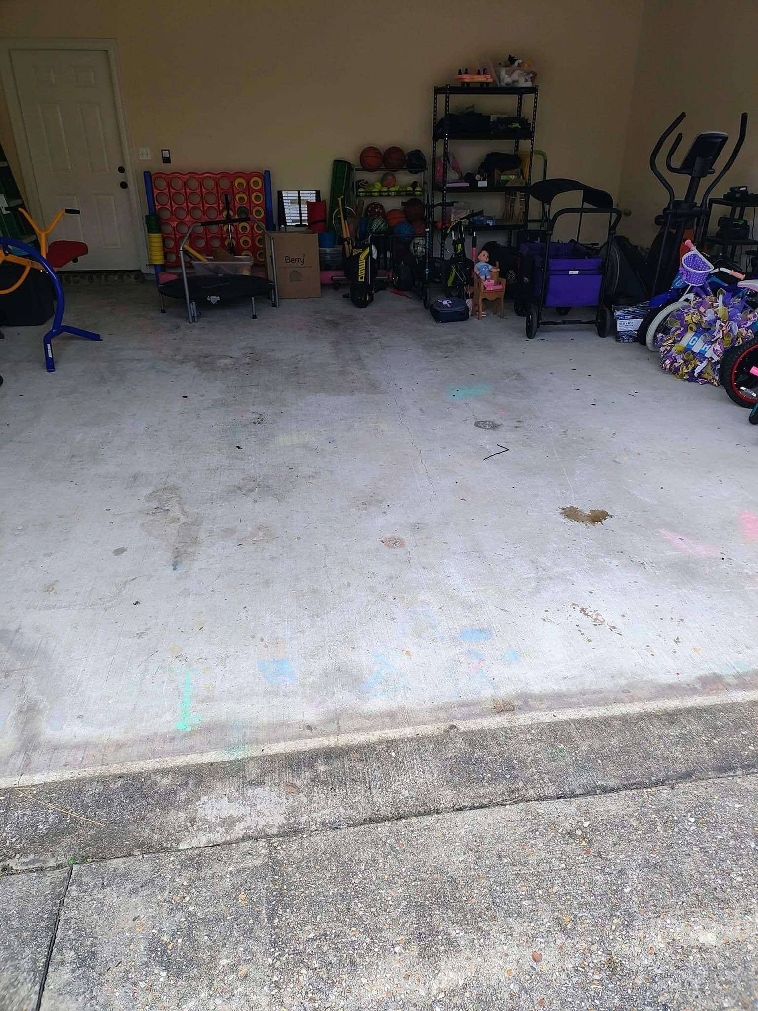 A garage filled with lots of toys and bikes.