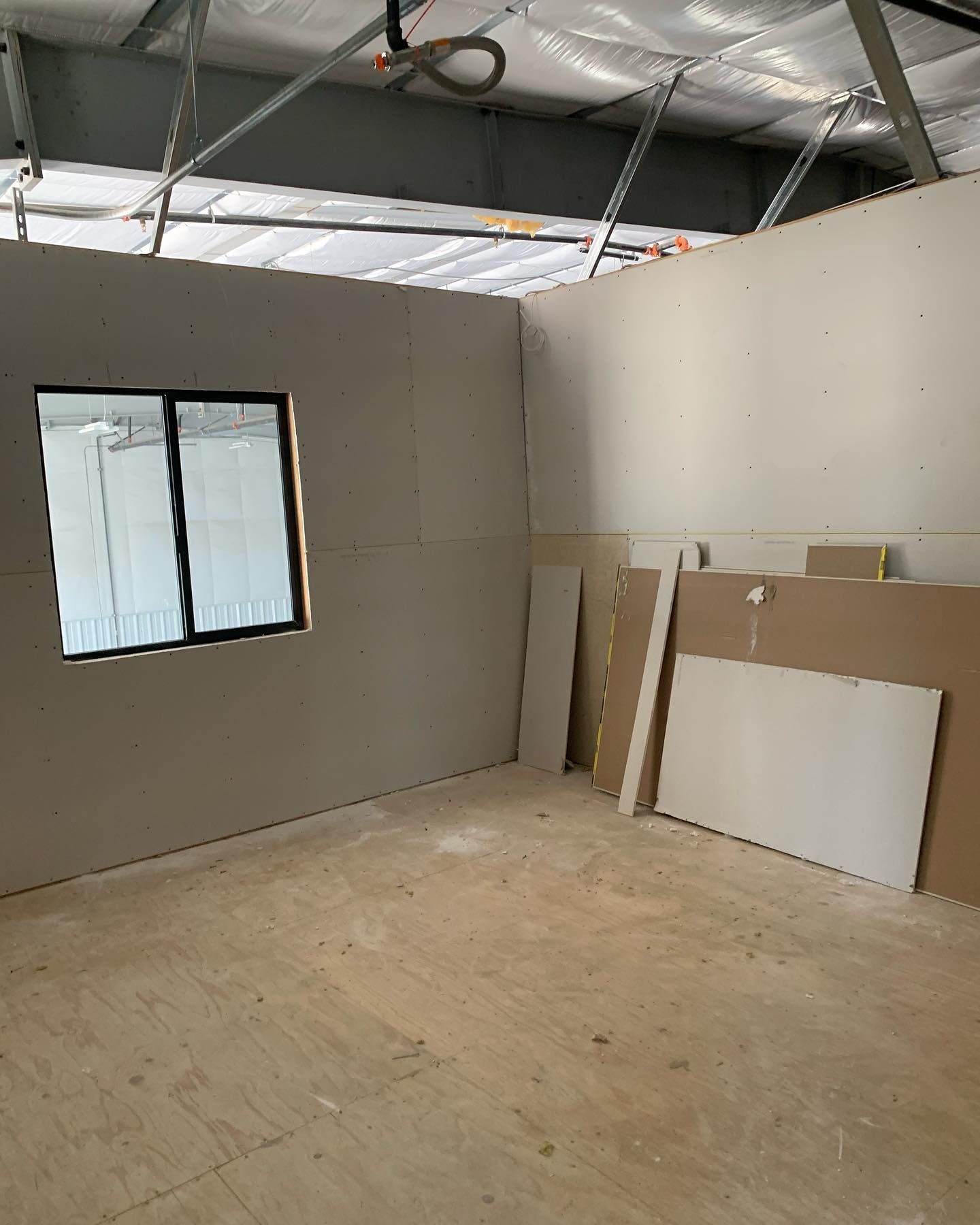 There is a window in the middle of the room.