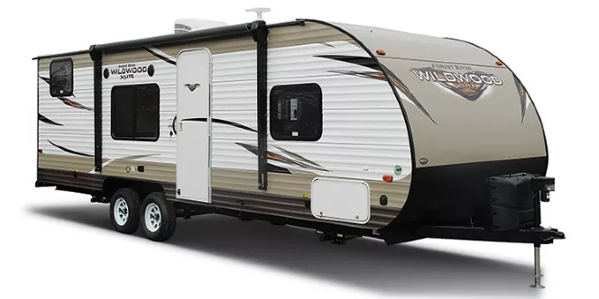 Tan and white travel trailer with a black front and two wheels.