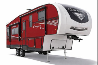 Red and white Cougar fifth wheel RV on a white background.