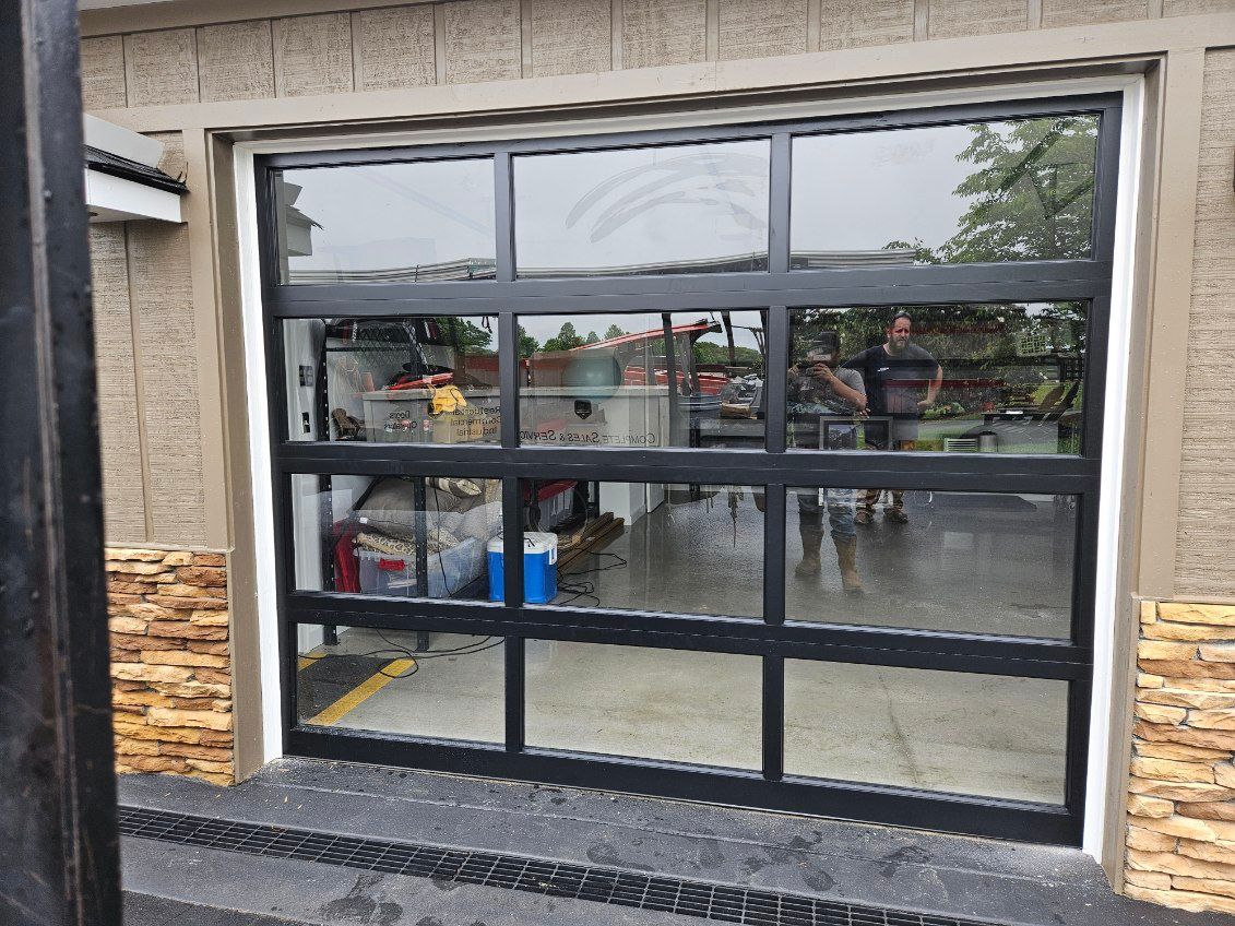 A garage door with a lot of windows on it
