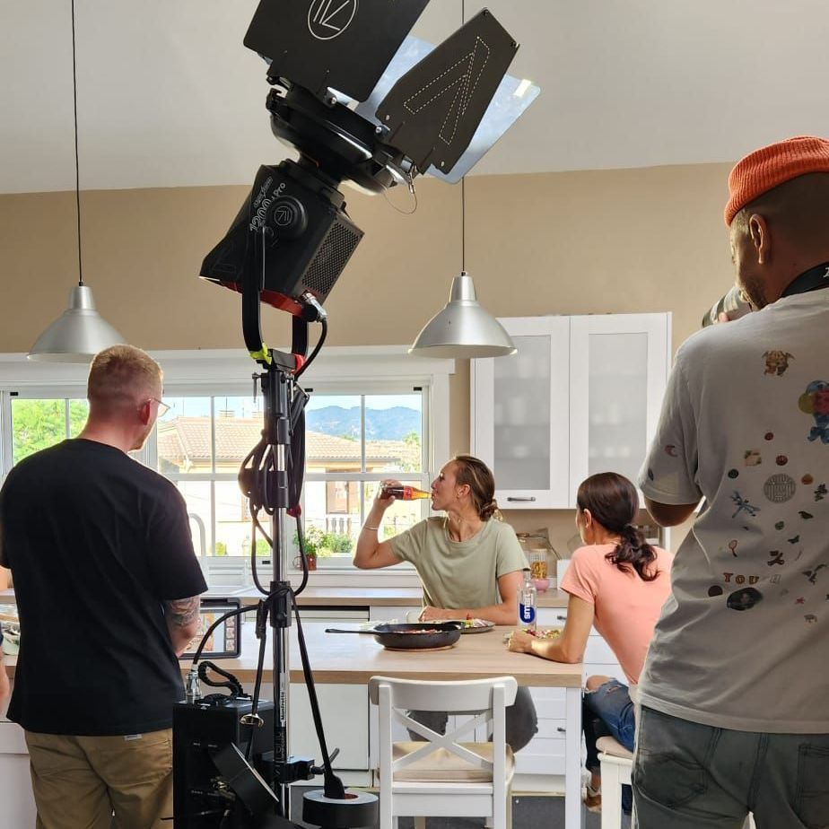 Emma Twigg taking drink of sponsor product