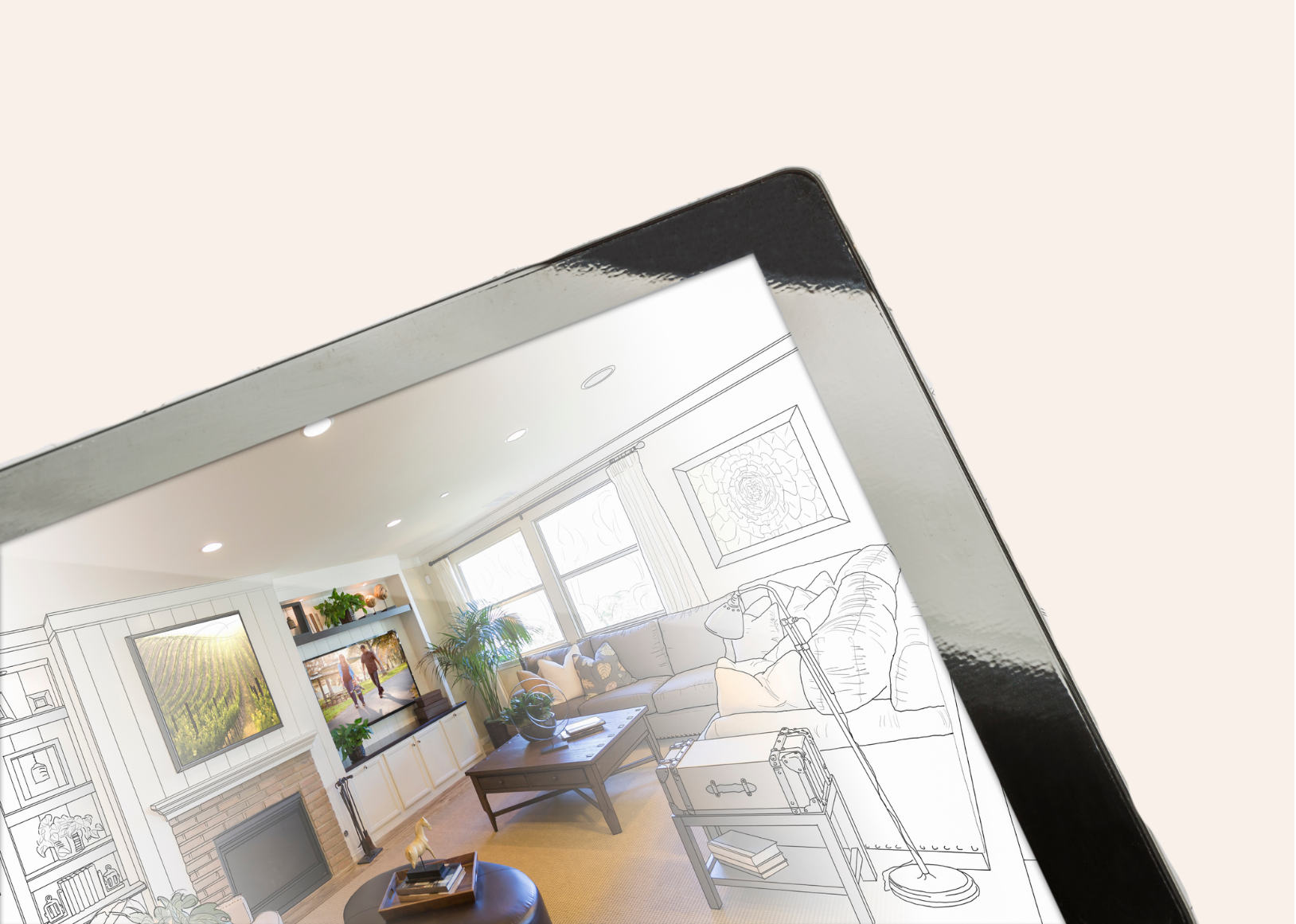 Tablet displaying living room interior design sketch overlaid on a photo.
