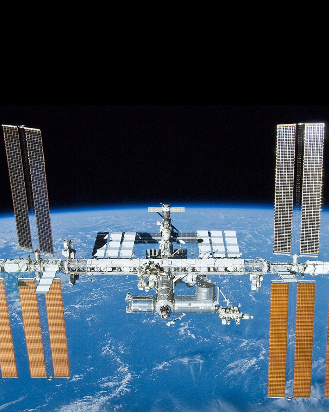 International Space Station orbiting Earth with solar panels.