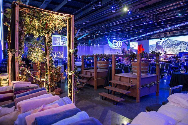 A large room filled with lots of chairs and tables.