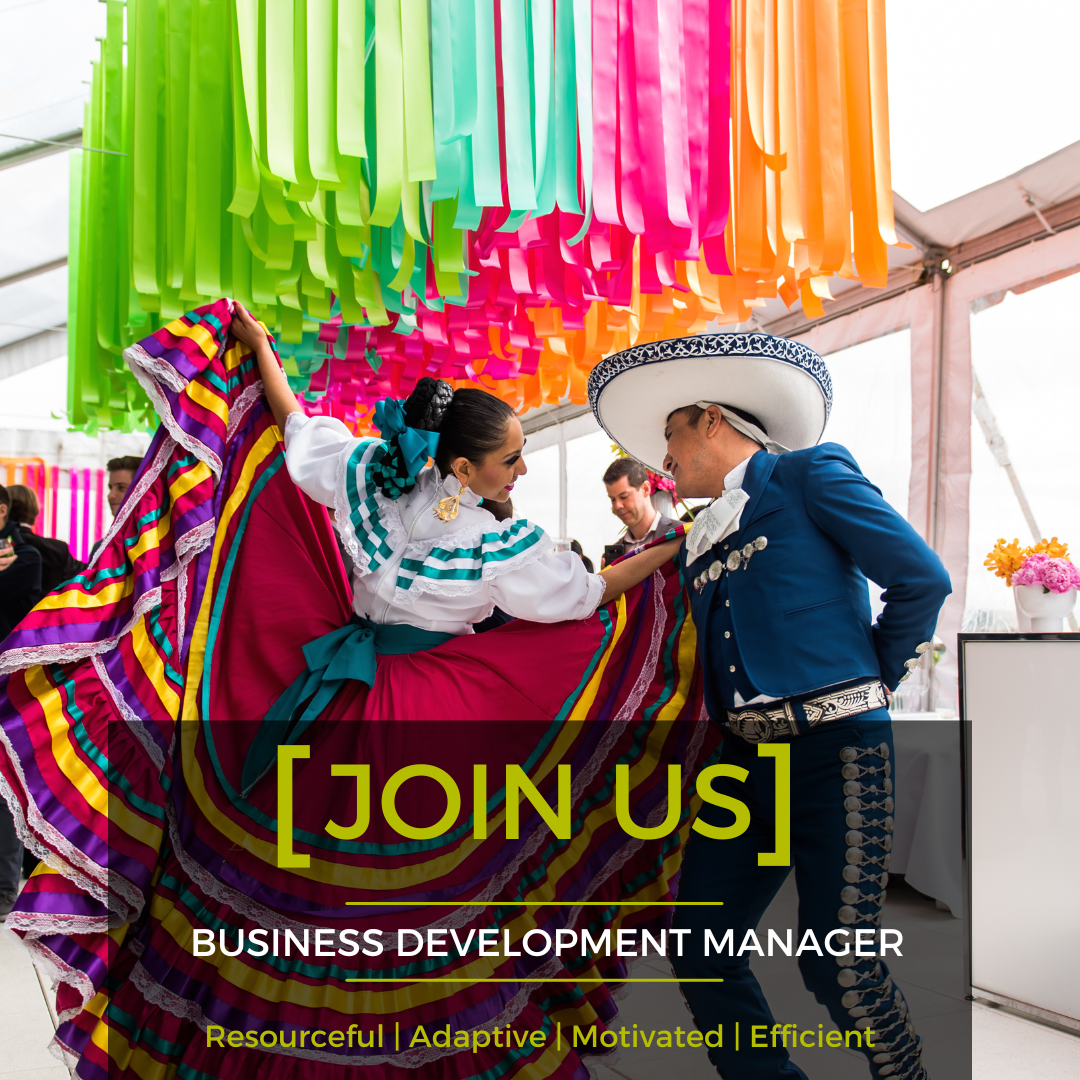 A business development manager is looking for a woman in a colorful dress