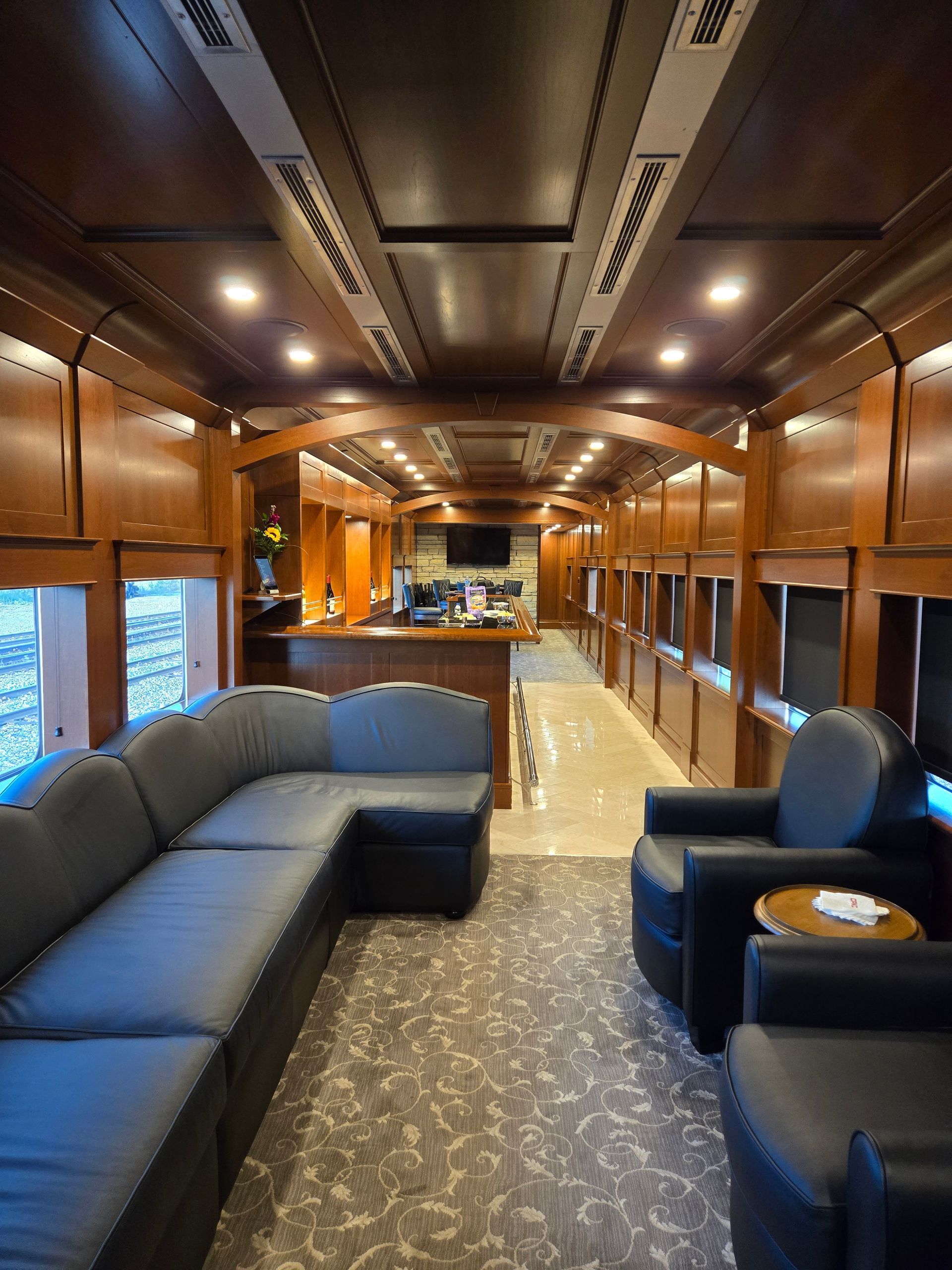 A living room with a couch and chairs in it