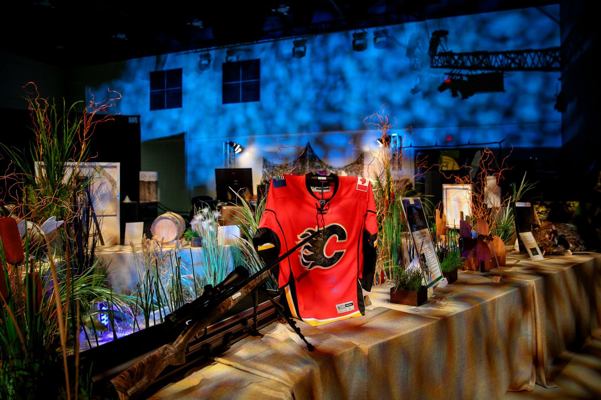 A table with a red shirt with the letter c on it
