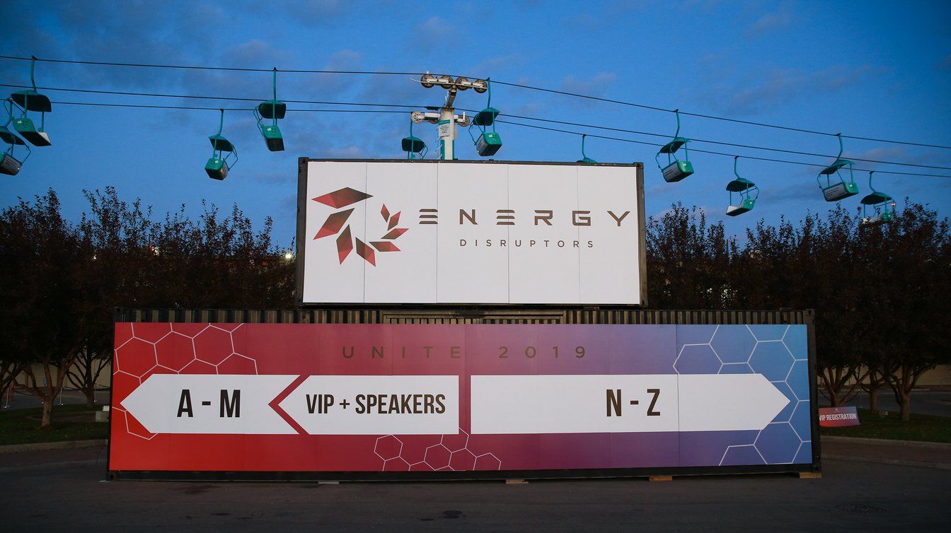 A red and white sign that says energy on it