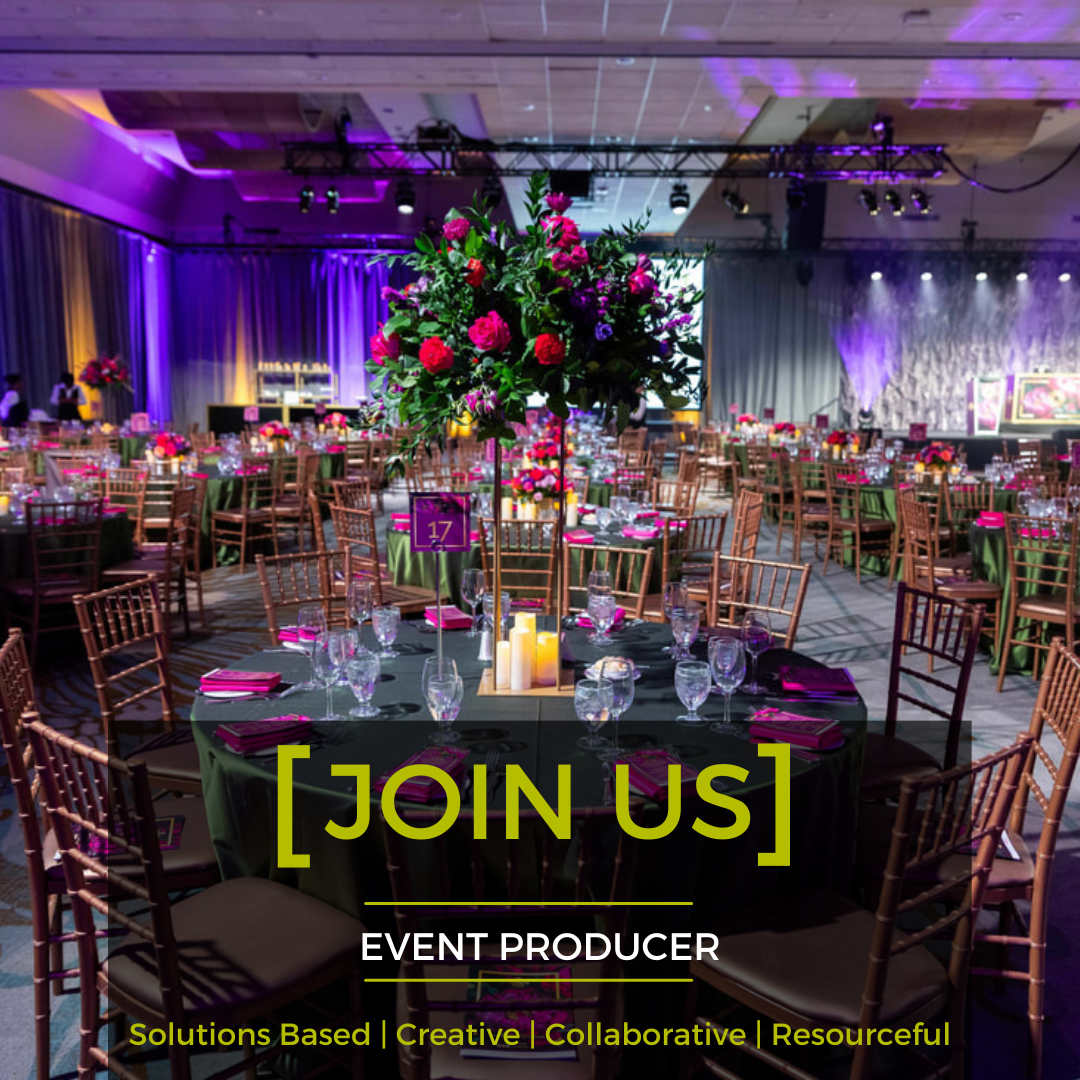 A large room with tables and chairs and a sign that says join us event producer