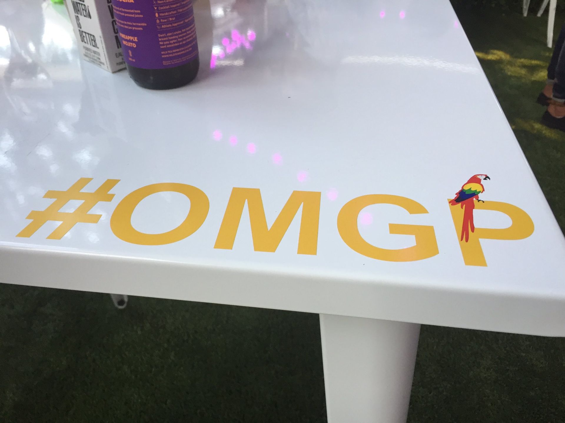 A white table with #omgp written on it