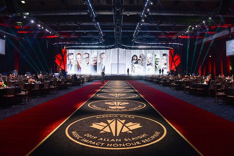 There is a red carpet in the middle of the room.