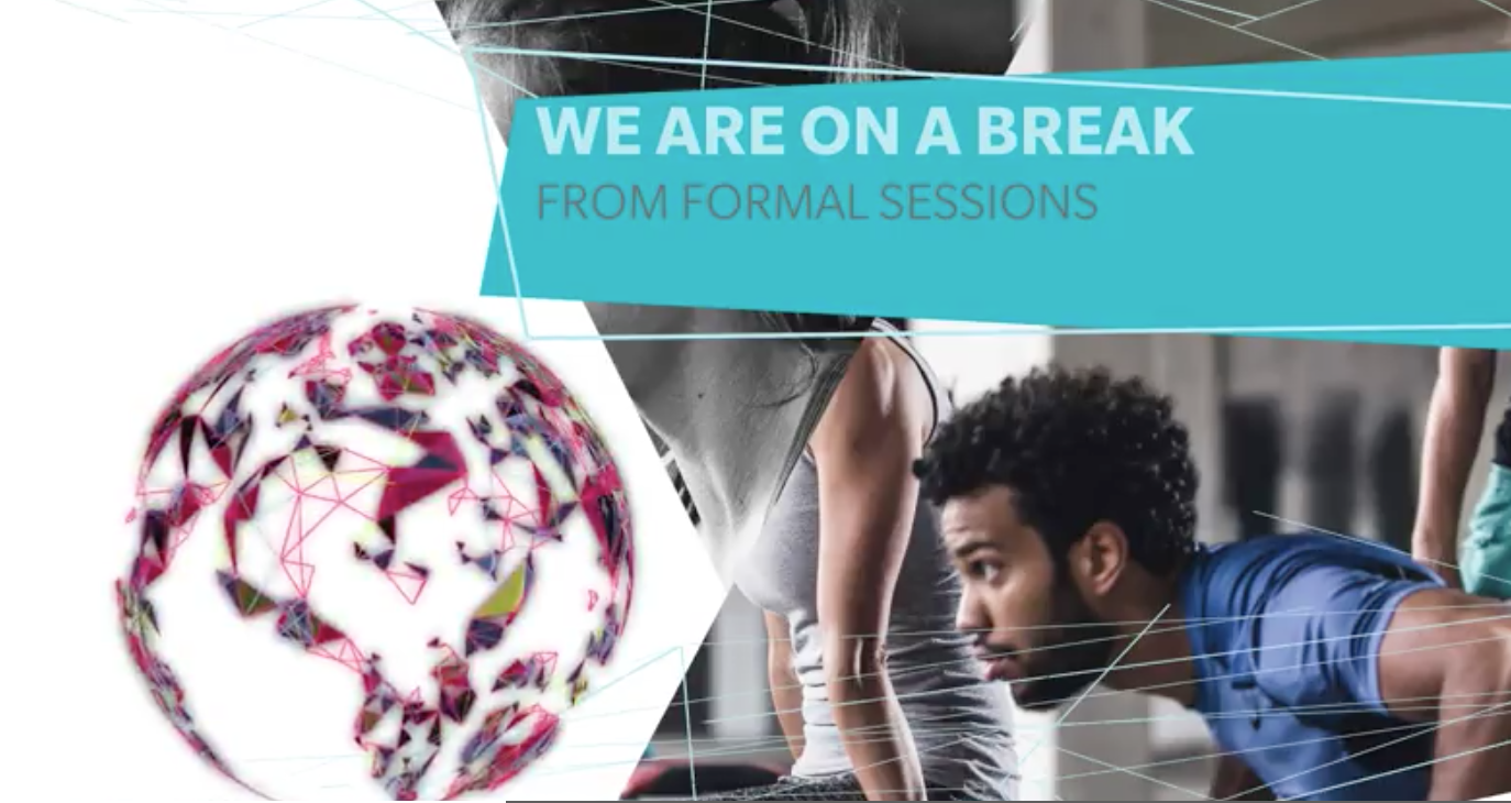 A man is doing push ups in front of a globe that says we are on a break from formal sessions