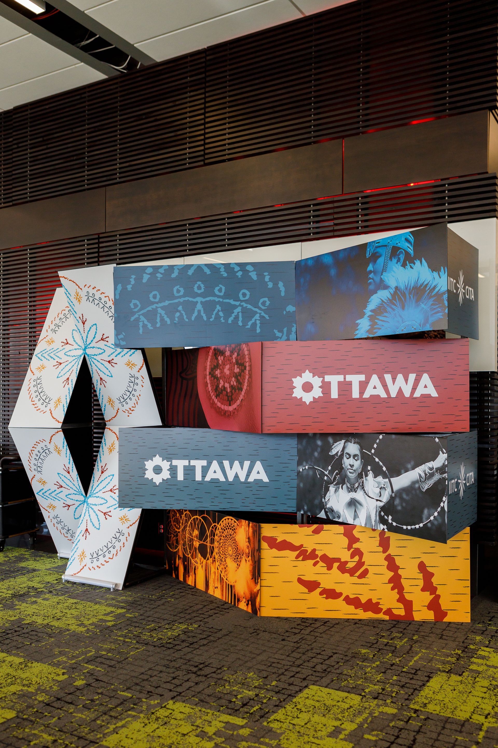A stack of boxes sitting on top of each other in a room.