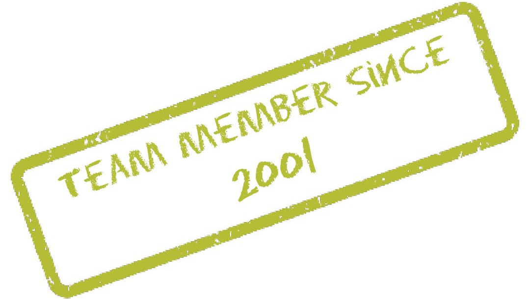 A green stamp that says team member since 2001