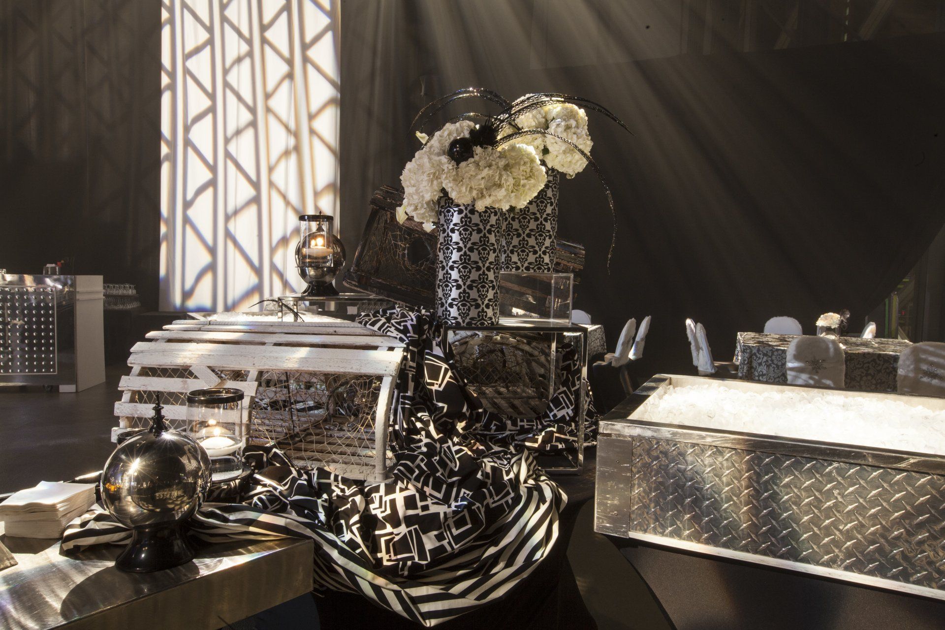 A table with a vase of flowers on it