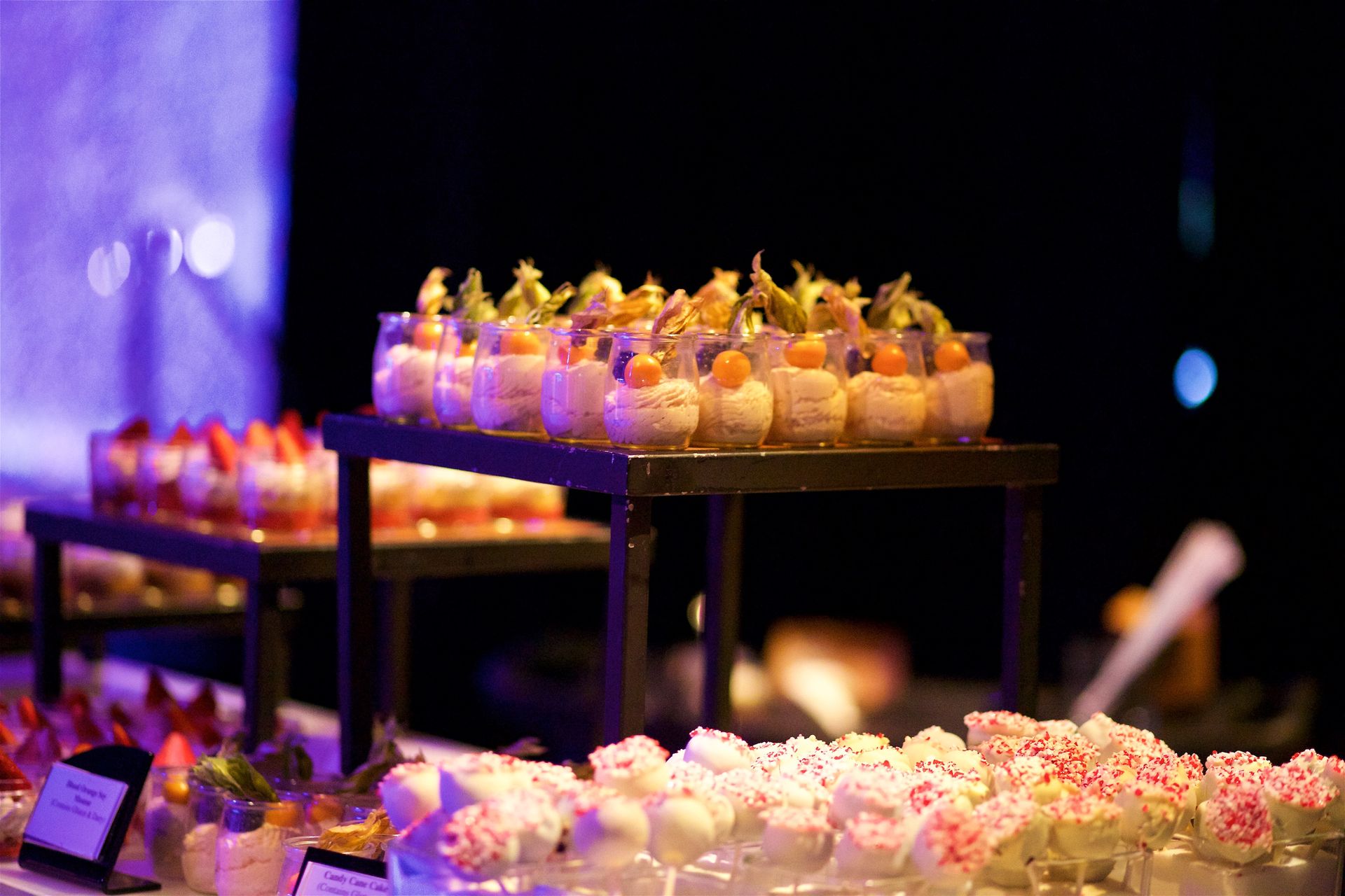 A buffet table with a variety of desserts on it.