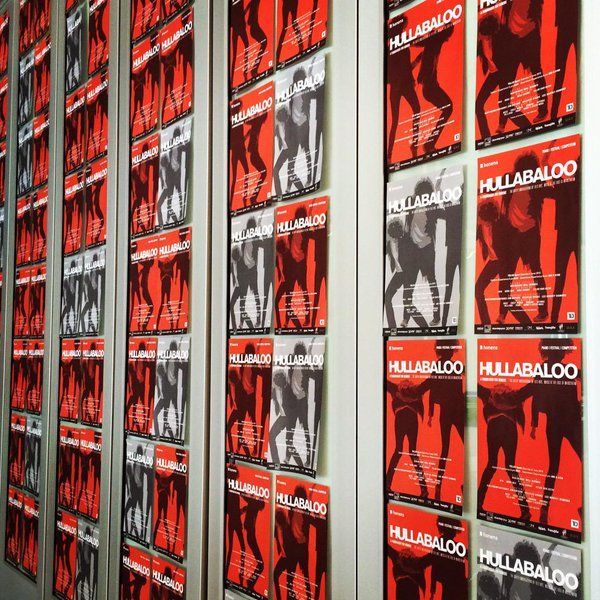 A row of posters with the word hullabaloo on them