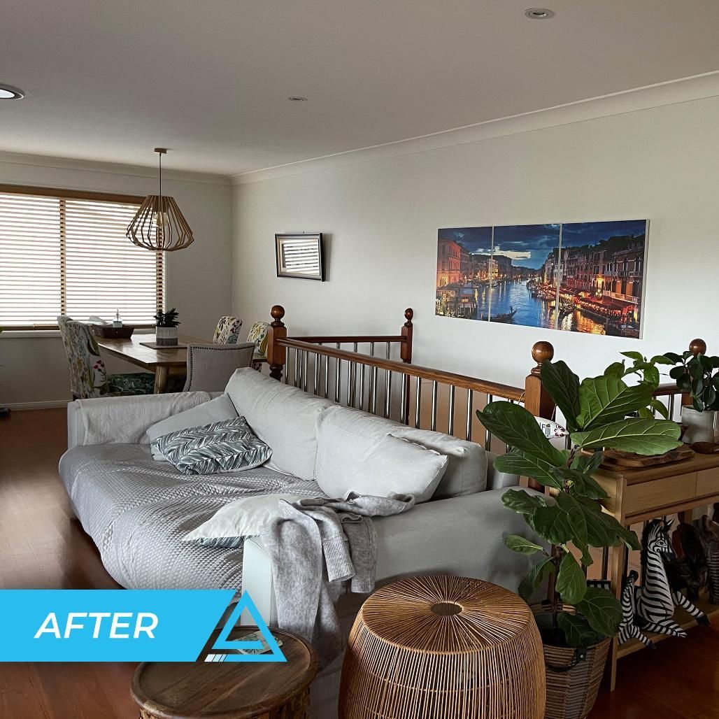 A Living Room With A Couch, Table, Chairs And Plants — APEX Painting & Maintenance In Corrimal, NSW
