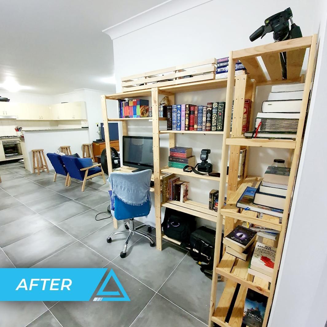 A Picture Of A Room With Books — APEX Painting & Maintenance In Calderwood, NSW