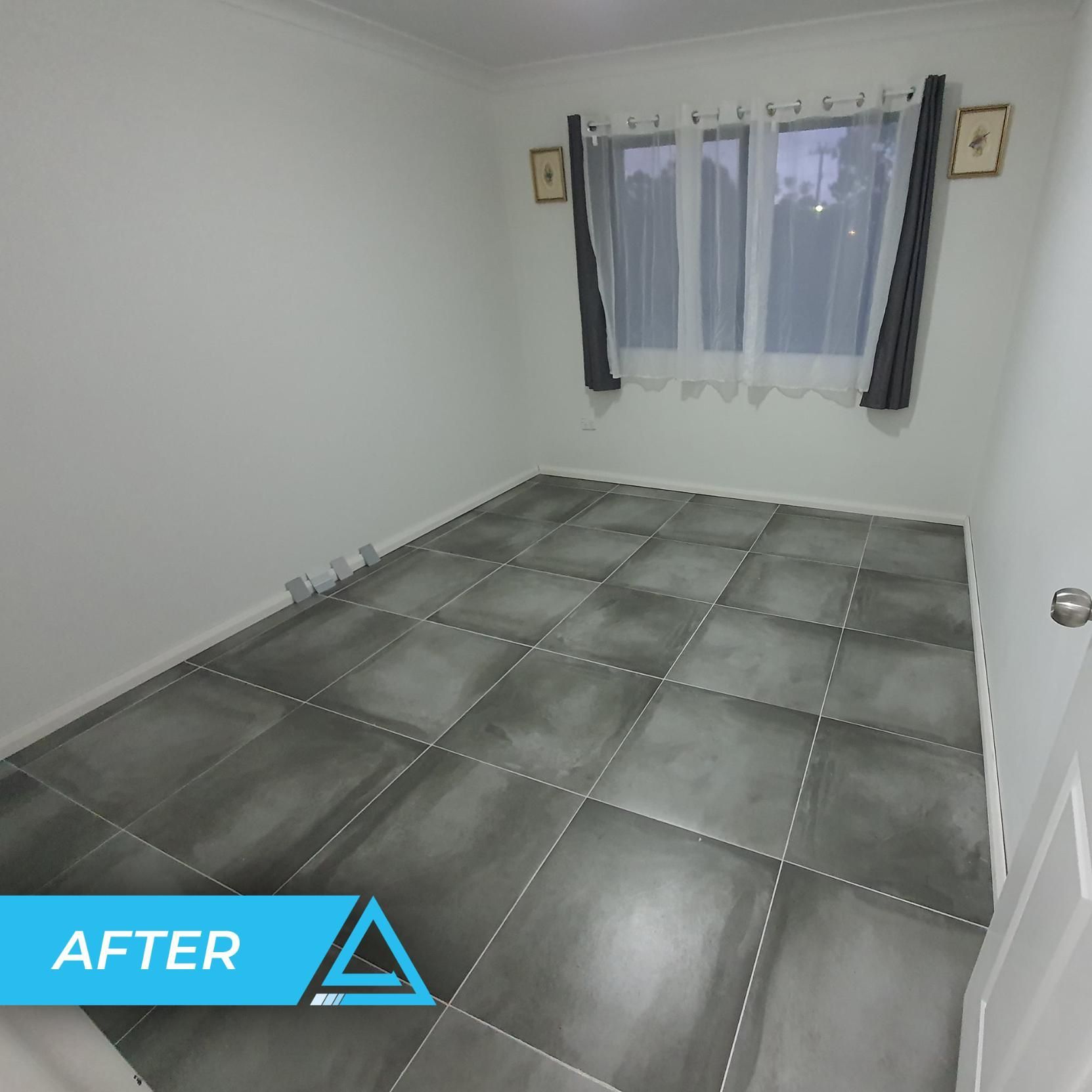 A Room With A Gray Tile Floor — APEX Painting & Maintenance In Cordeaux Heights, NSW