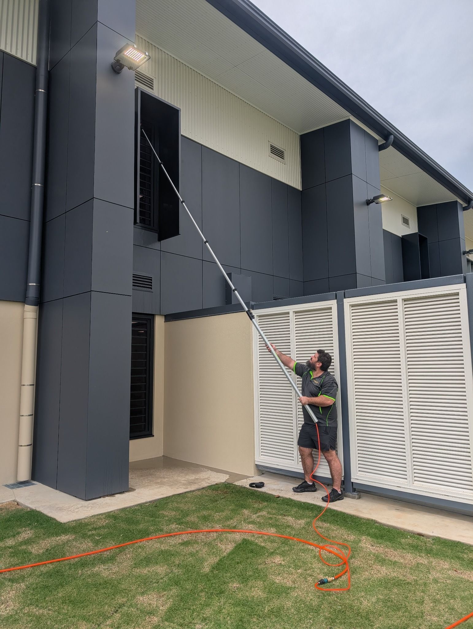 Cleaning Second Floor Windows Of Commercial Premises — Pristine Cleaning Bundaberg In Kalkie, QLD