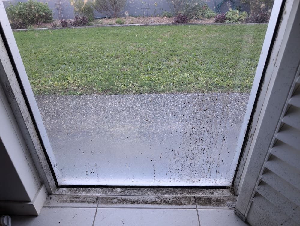 Glass Door Covered in Condensation — Pristine Cleaning Bundaberg In Kalkie, QLD