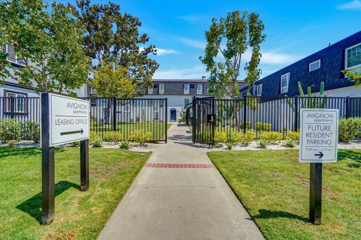 Avignon building exterior walkway with trees